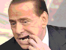 Berlusconi dente rotto