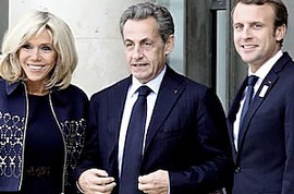 Sarkozy tra i coniugi Macron